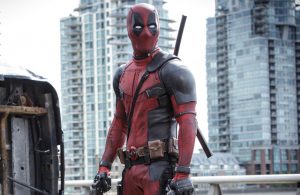 A promotional still from DEADPOOL featuring the titular character.