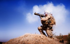 A Marine firing a rocket.