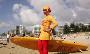 A lifeguard wearing a burkini.