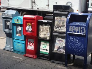 A row of newspaper racks.