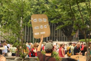 A protester carrying a sign
