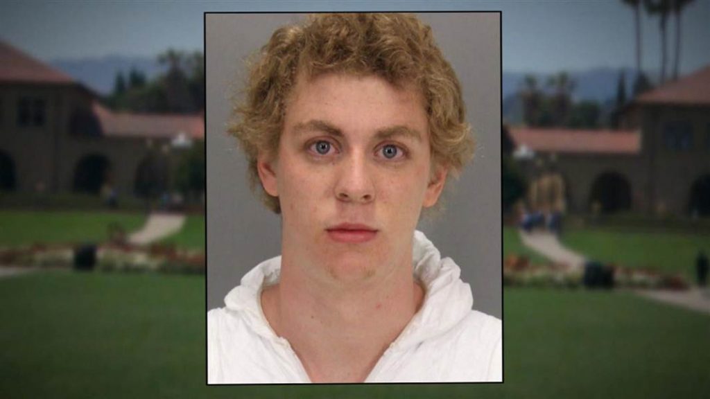 A headshot of a young white man.