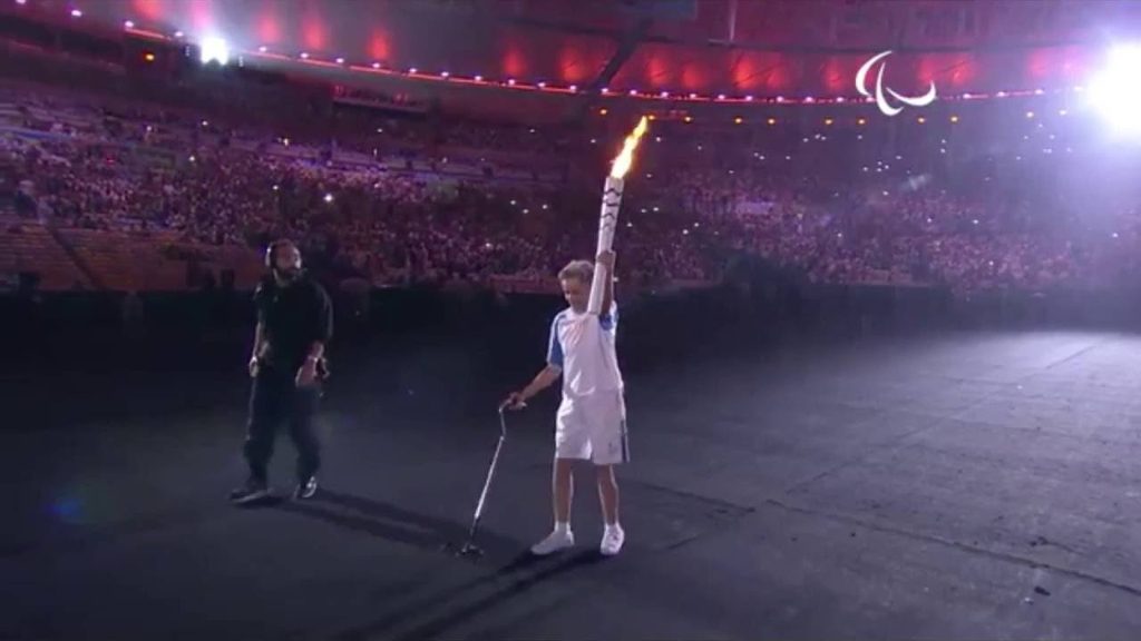 Athlete Marcia Malsar carrying the torch during the opening ceremonies of the 2016 Paralympics.