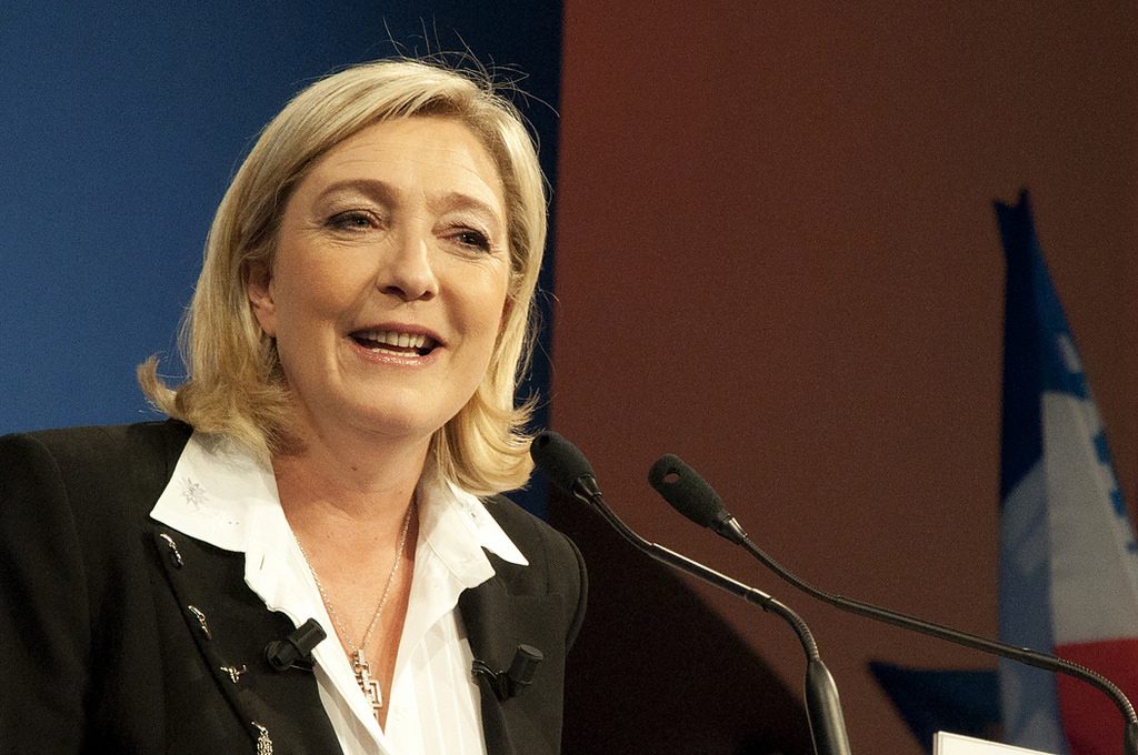 Marine Le Pen speaking at an event.