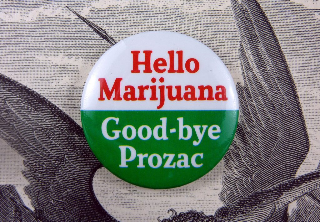 A button reading HELLO MARIJUANA GOODBYE PROZAC