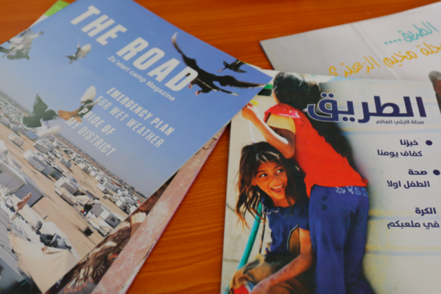 Copies of a refugee magazine