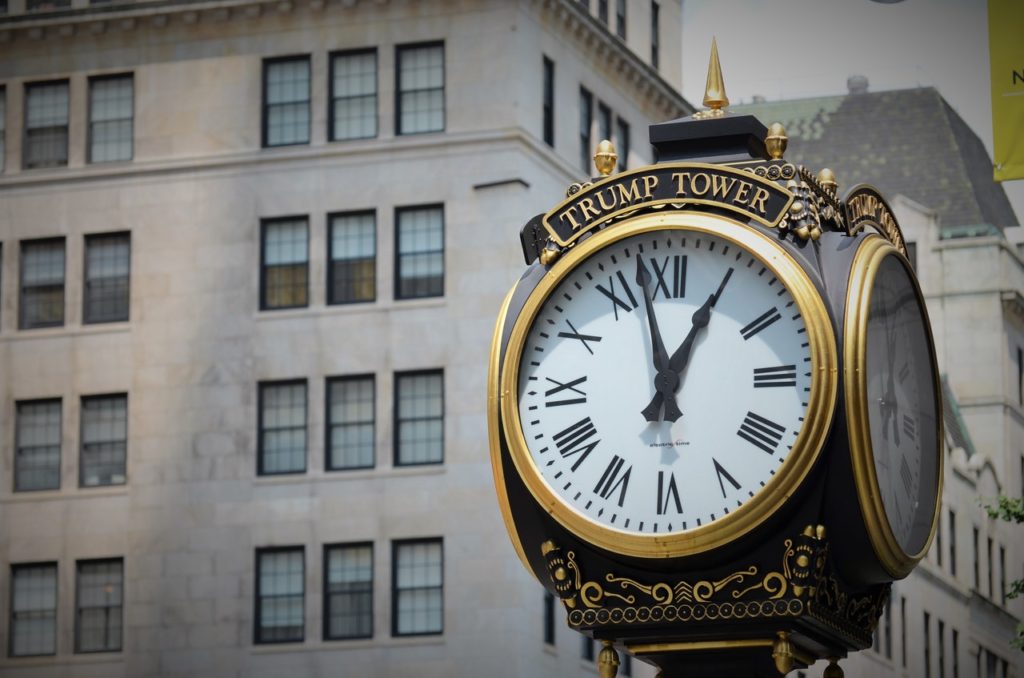a gilt clock outside trump tower