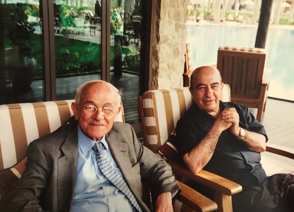 With his lifelong friend and brother-in-law Hamdi Abdul Majeed