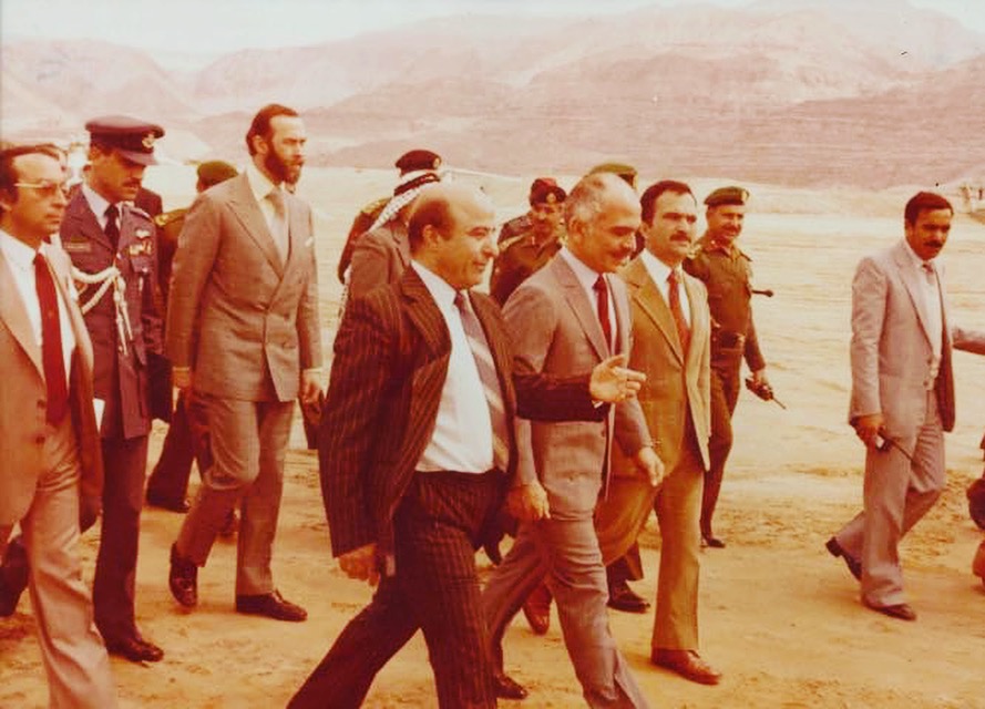 Caption: With King Hussein, Crown Prince Hassan and Prince Michael of Kent during a visit to the Potash project